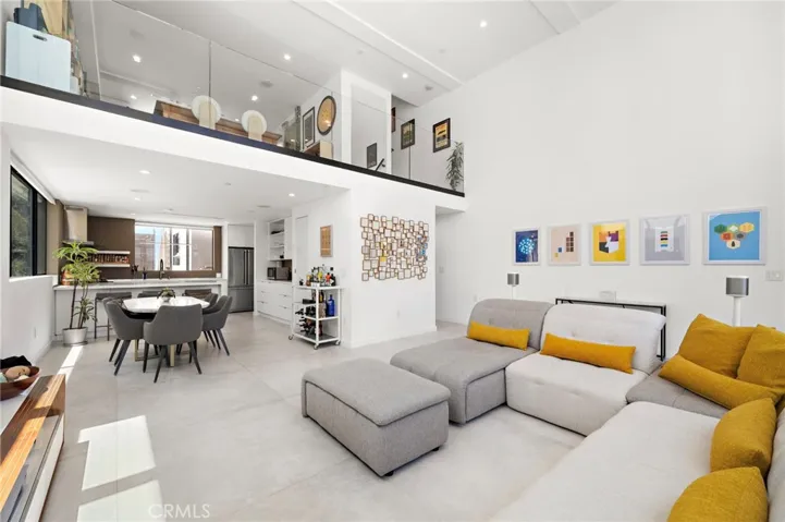 The home showcases a flawless blend of clean lines, custom details, and an intuitive multi-level floor plan.