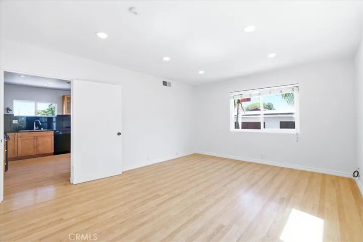 Additional interior perspective showcasing the spacious floor plan and connection between living areas.