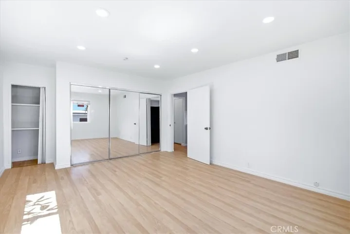 Wide interior view highlighting the home's open design, bright finishes, and inviting flow.