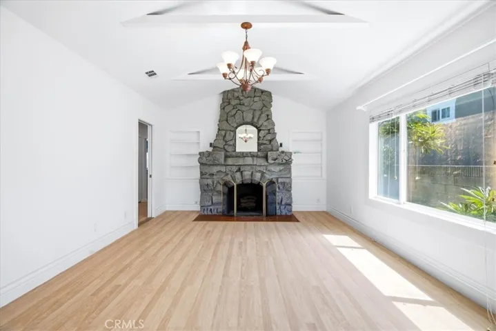Living area view highlighting the expansive layout, abundant natural light, and seamless flow throughout the home.