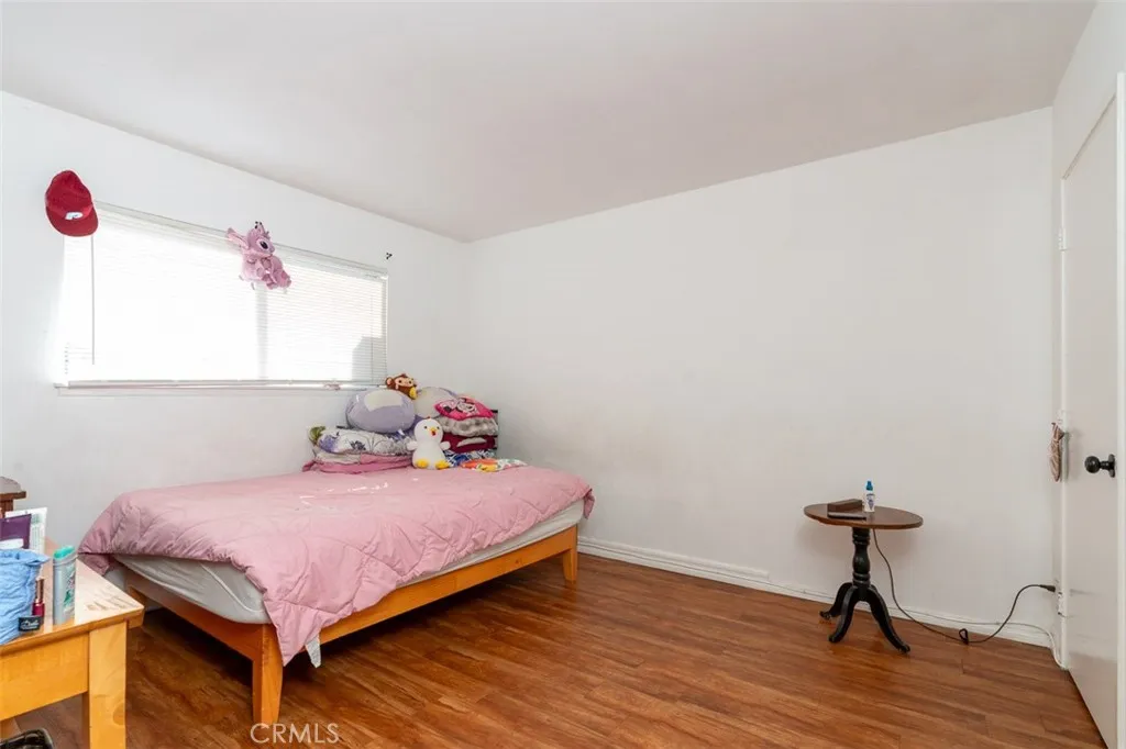Spacious primary bedroom with plenty of room to unwind.