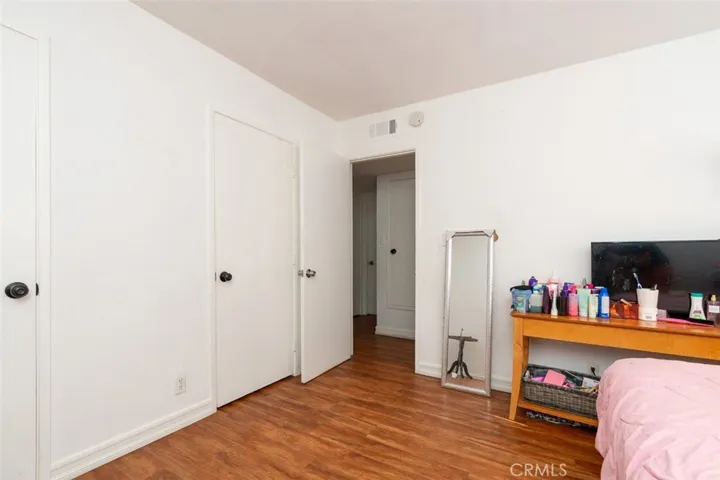 Spacious primary bedroom with plenty of room to unwind.
