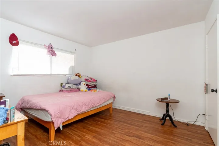 Spacious primary bedroom with plenty of room to unwind.