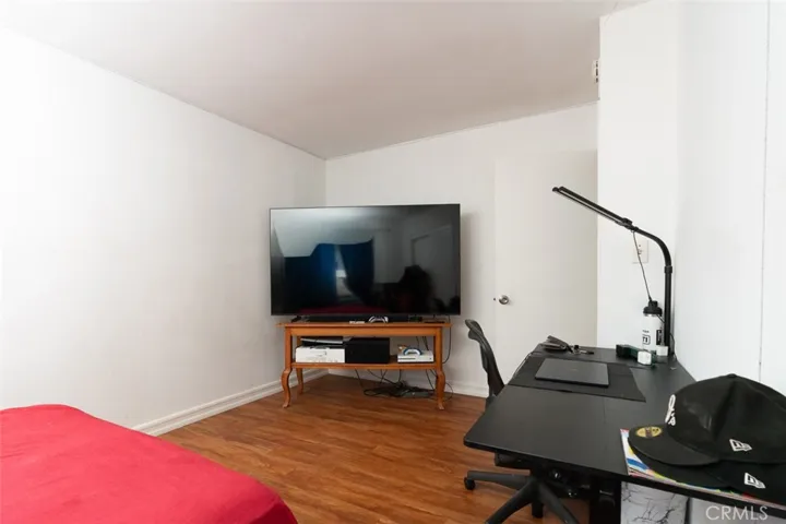 Spacious primary bedroom with plenty of room to unwind.