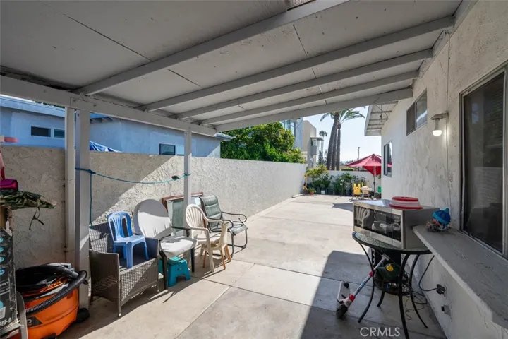 Private covered patio perfect for relaxing or outdoor dining.