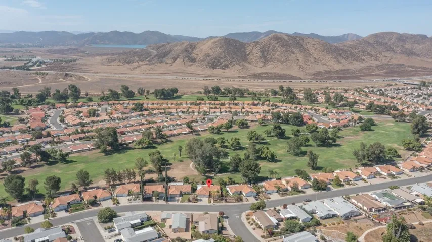 Aerial view of the home, scenery behind-home marked virtually