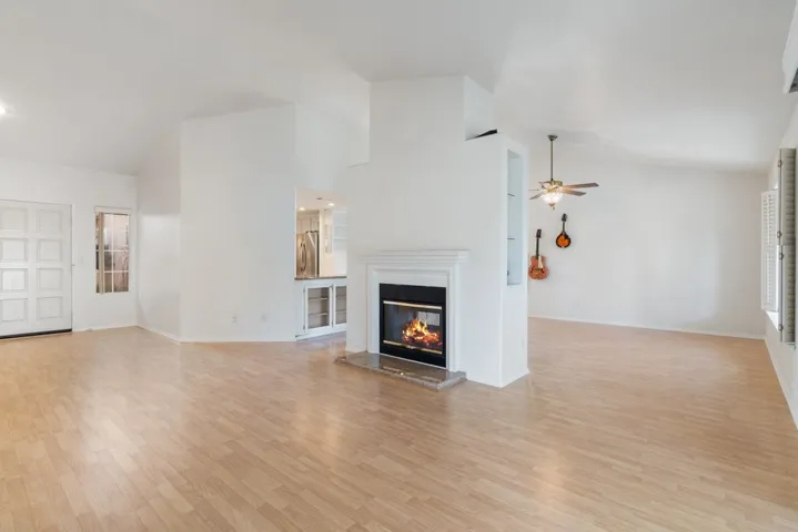 Dual sided fireplace with mantel