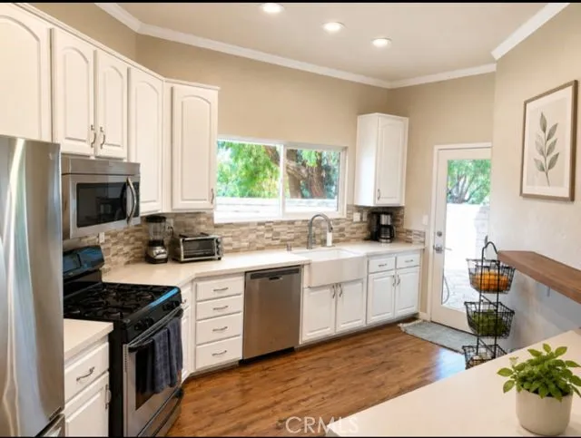 Open update kitchen with stainless steel appliances