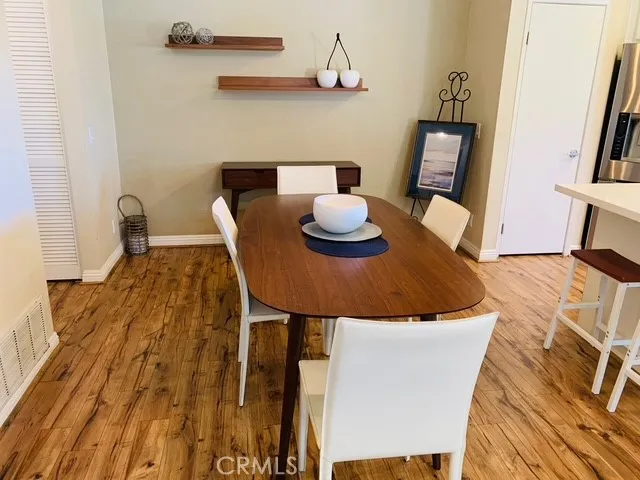 Separate dining area off living room and kitchen