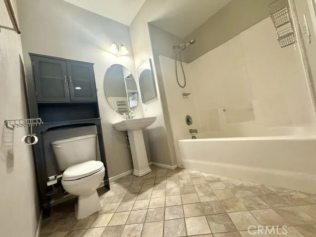 over the toilet storage organizer can be removed .