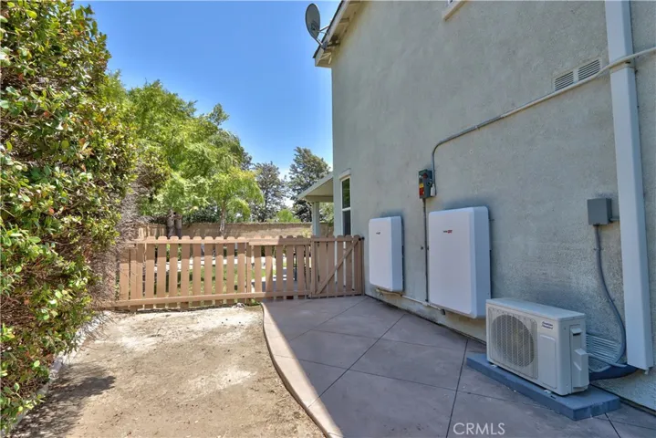 view from the gate entrance to the left of the garage.