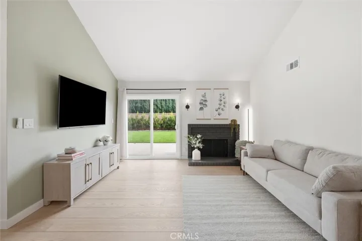 Living room opens to the backyard
