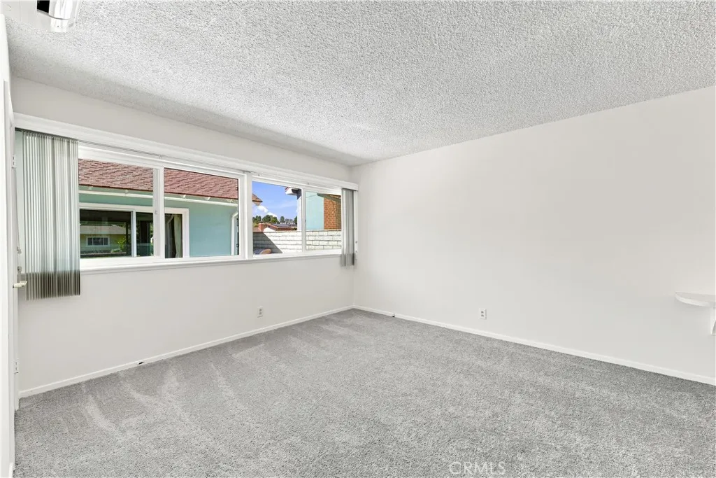 The primary bedroom with newer carpet