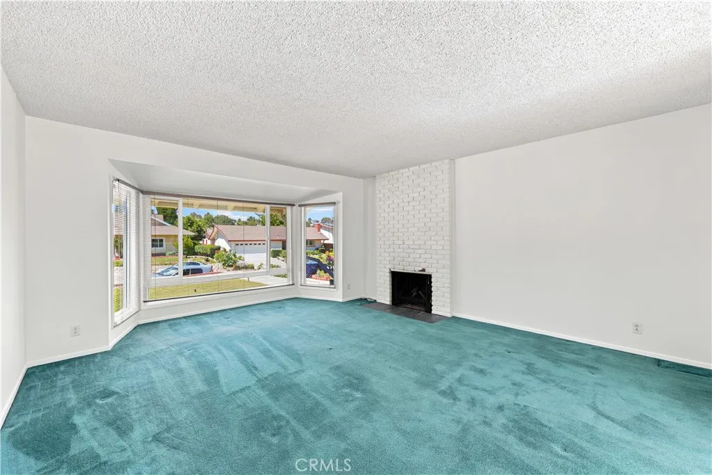 Open & bright & airy family room with fireplace