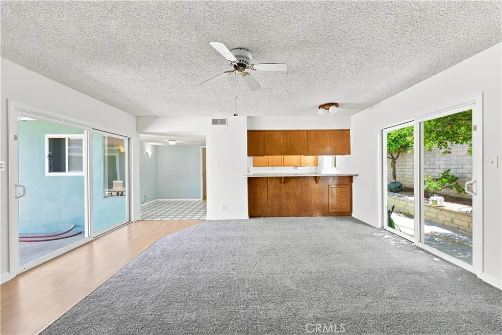 2 dual paned sliding doors to the outside patio area and to side of home