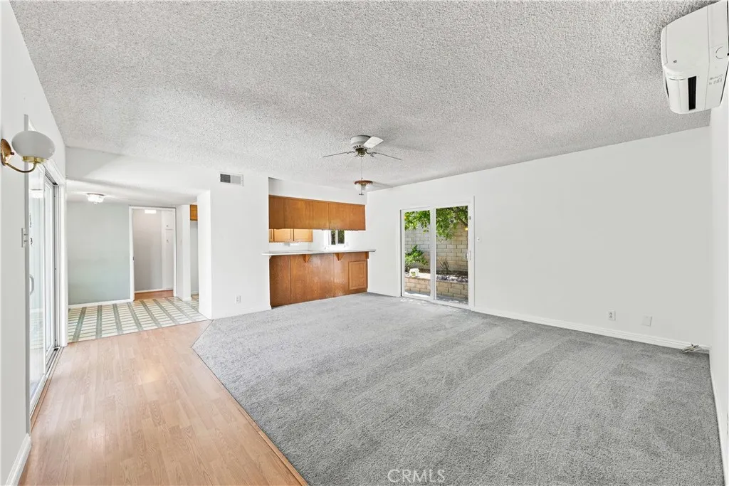Spacious second family room by kitchen with newer carpet