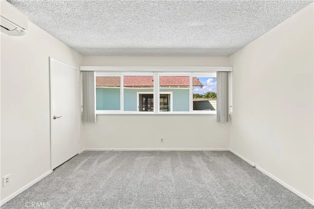 View to the outdoor patio from the primary bedroom