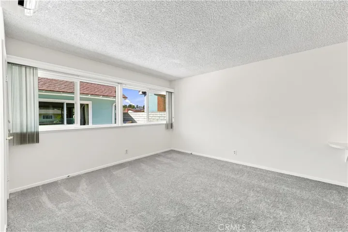 The primary bedroom with newer carpet