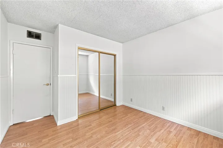 Entryway to 2nd bedroom & closet
