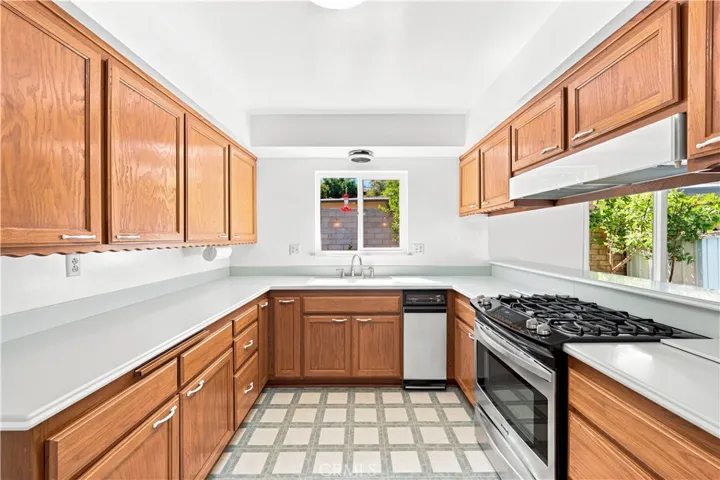 Nice clean kitchen with corian countertop ready to be used the way it is or can be remodeled to your own liking