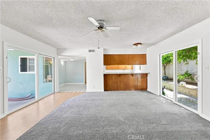 2 dual paned sliding doors to the outside patio area and to side of home