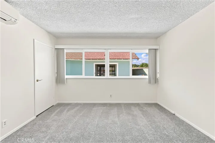 View to the outdoor patio from the primary bedroom
