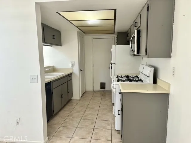 Large walk in pantry to left of the garage entrance door with another large shelf pantry (not shown) on the opposite side
