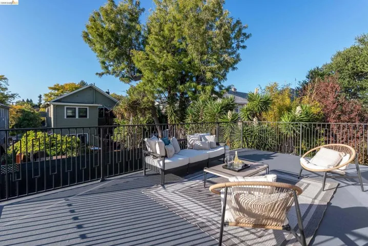 Expansive outdoor deck space featuring dark gray composite decking