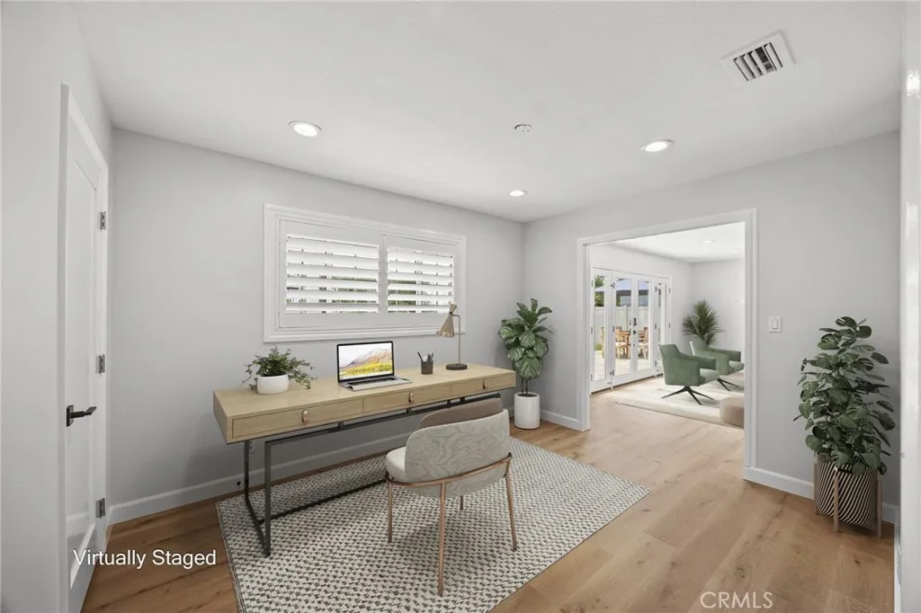 Virtually staged bedroom #5, which has been opened up to living room to create an office or can be used as formal dining, TV room etc. Can easily be converted back to 5th bedroom by closing the double door opening.