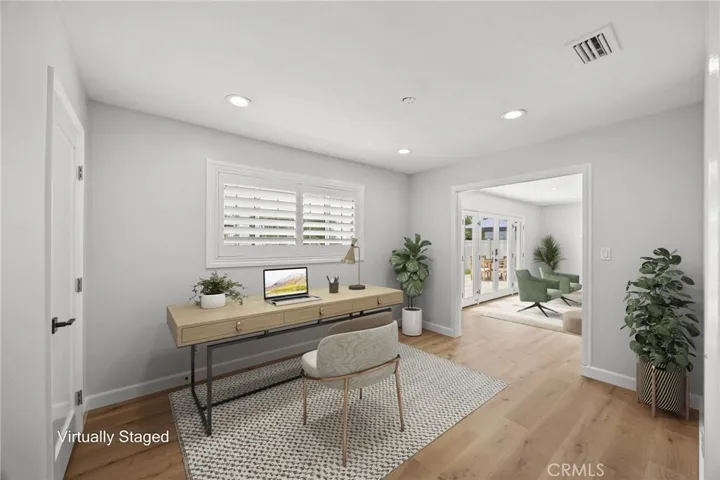 Virtually staged bedroom #5, which has been opened up to living room to create an office or can be used as formal dining, TV room etc. Can easily be converted back to 5th bedroom by closing the double door opening.