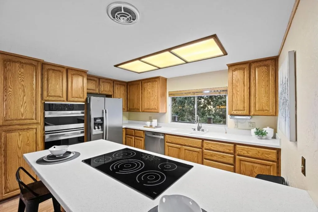 galley kitchen opens to the living and dining areas for connectivity