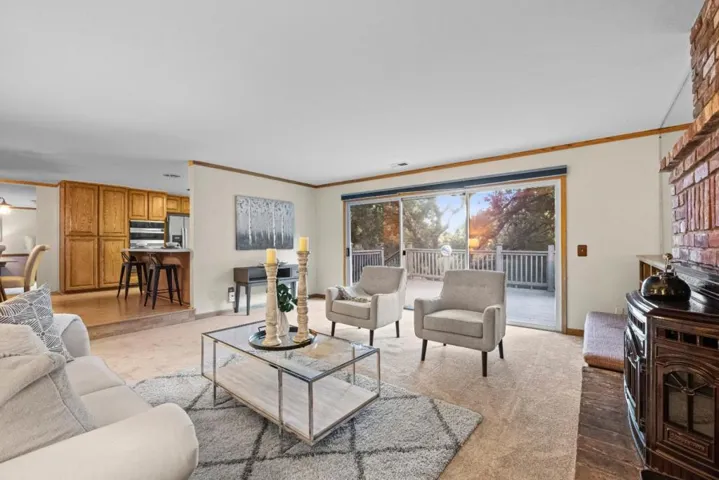 large sliding doors frame peaceful views of the surrounding oaks