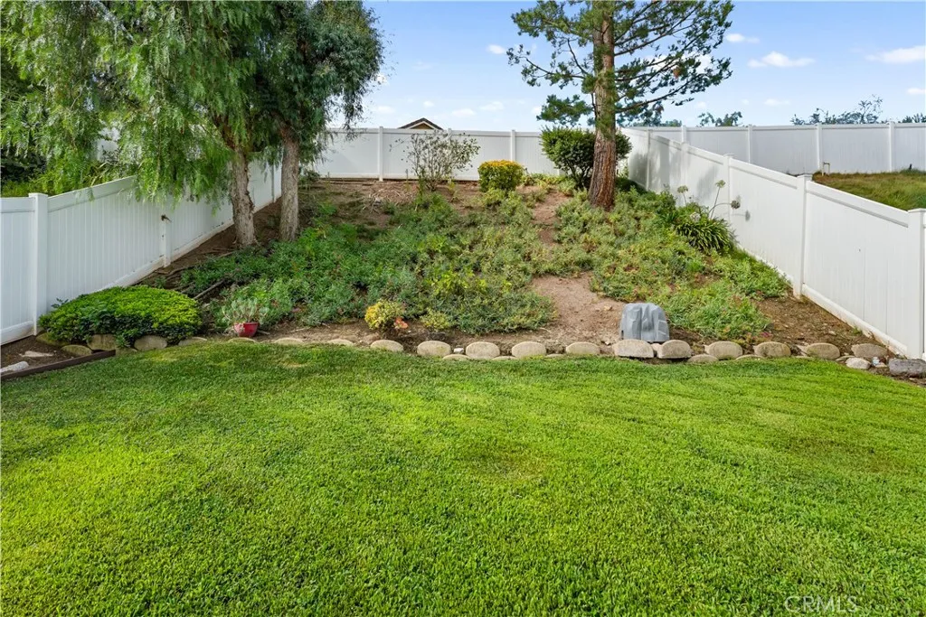 Lovely & good-size backyard with vinyl fencing