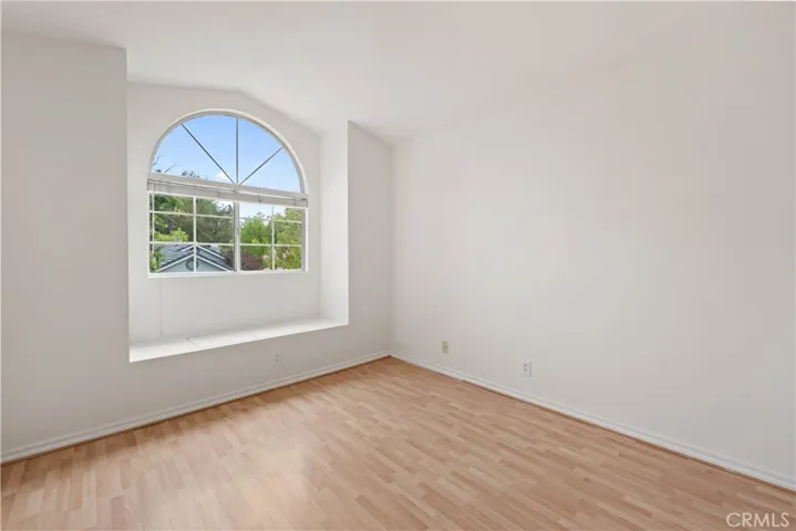Bedroom #2 with built-in seat with storage.
