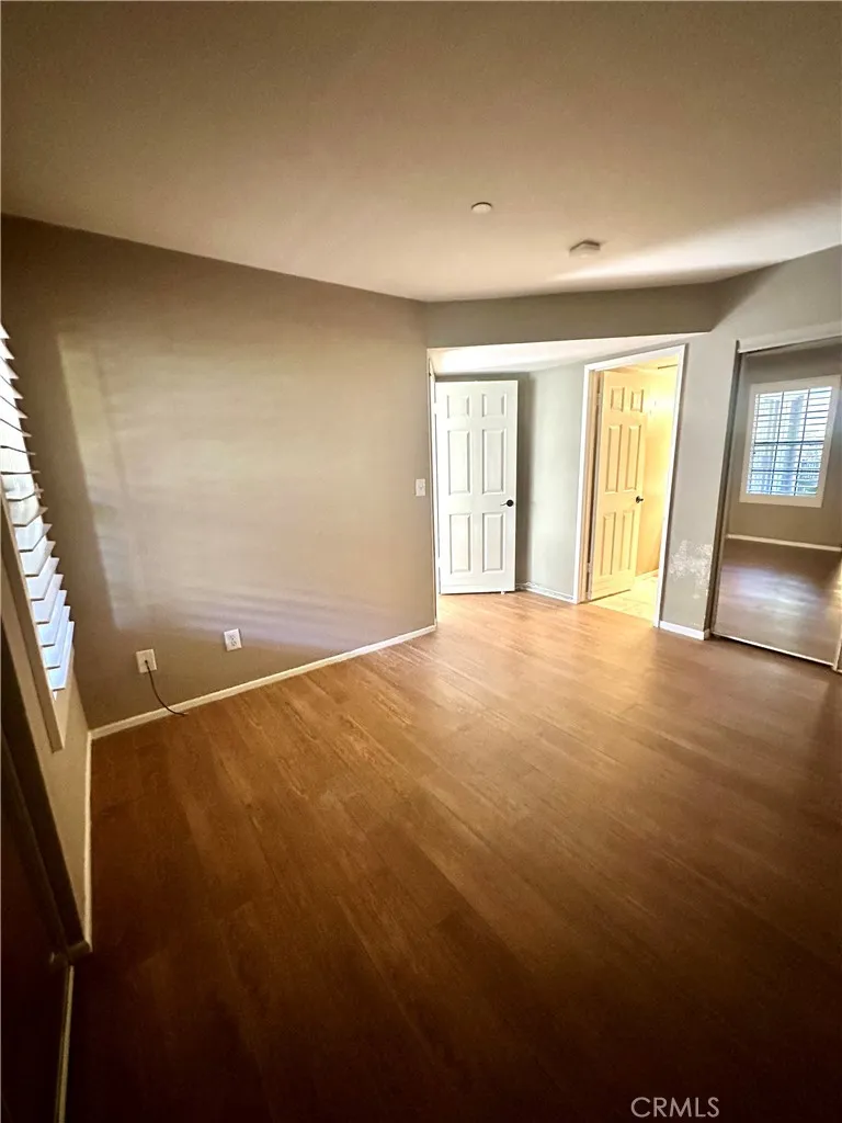 Primary bedroom with private full bathroom