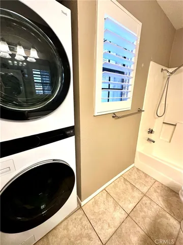Almost new Washer/dryer perfectly tucked away for extra space in secondary bath!