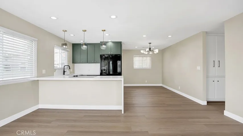 Beautifully renovated open concept apartment with a private laundry room.