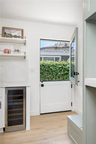Dutch door and wine fridge