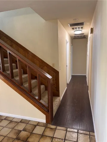 Hallway to rooms and bathroom