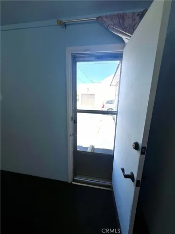Glass pane screen door.