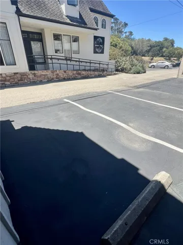 View from door towards parking and alley