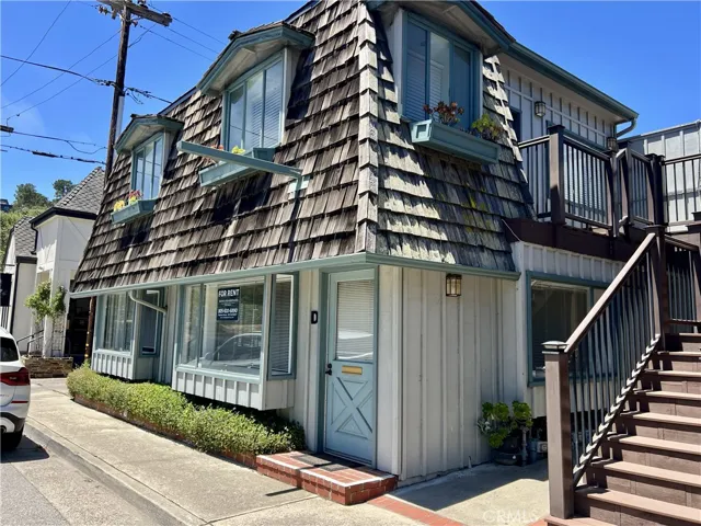 Unit D is near the staircase up to the other units. There is a bathroom inside of the unit. Mail is delivered to each unit underneath the stairs.