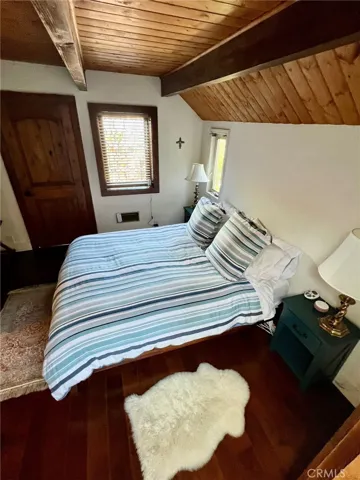 Off kitchen is main floor primary bedroom with west facing view