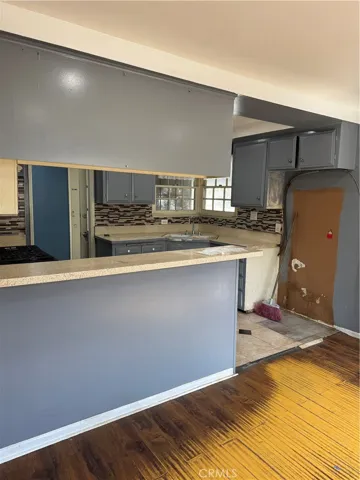 Kitchen open to dining.