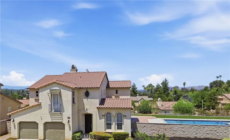 Front of Home with Pool View