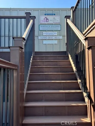 Stairs up and signage area for your services