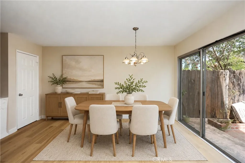 Dining area. Virtually staged using AI for illustrative purposes.