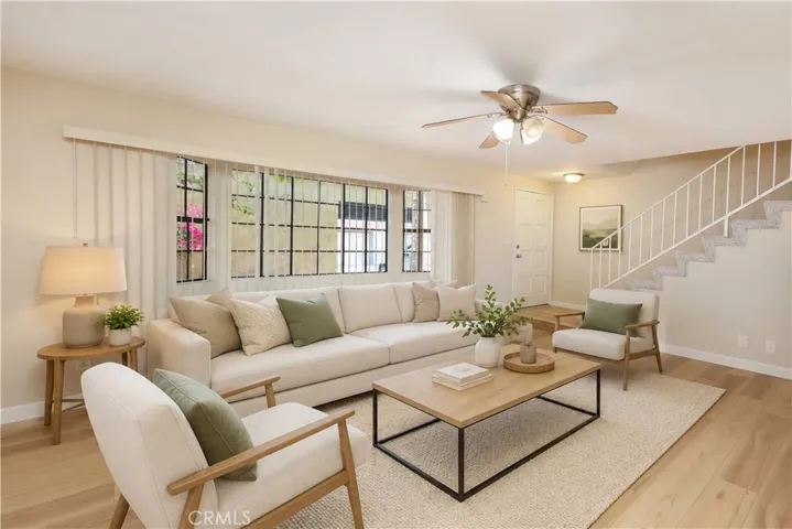 Living room. Virtually staged using AI for illustrative purposes.