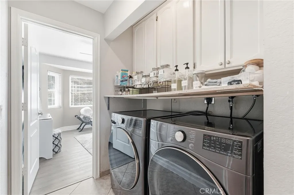 Laundry area is inside the house.