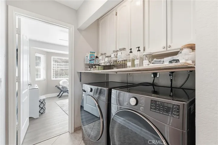 Laundry area is inside the house.
